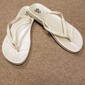 Ivory flip flops